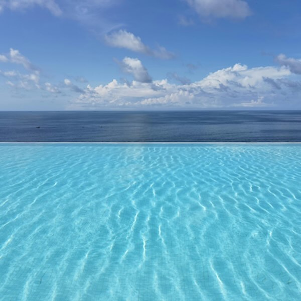 infinity pool under cloudy sky 600x600