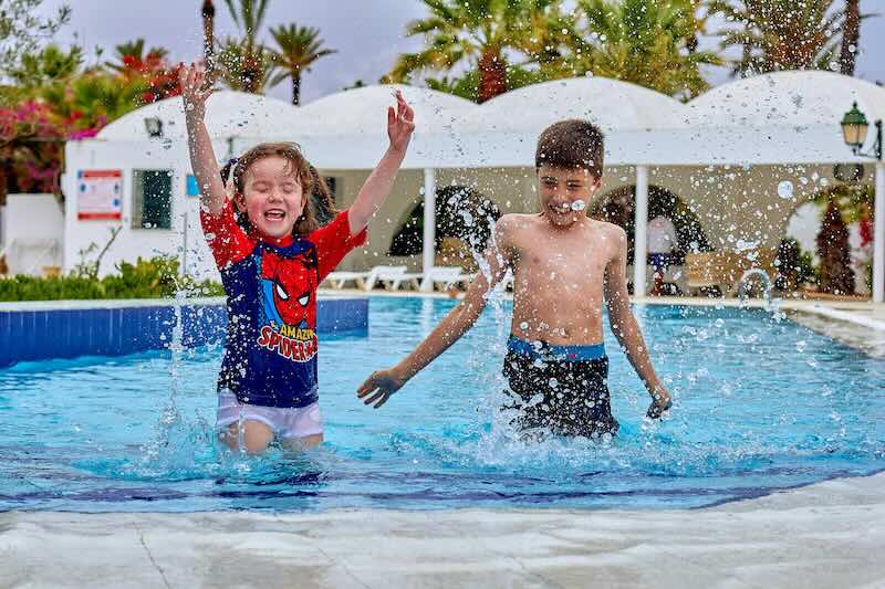kids playing in swimming pool pcb copy
